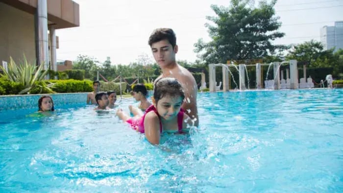 Indian kid swimming