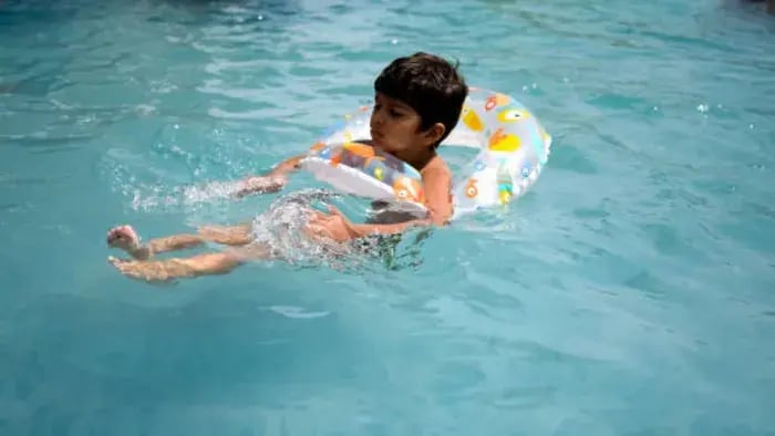 Indian kid swimming