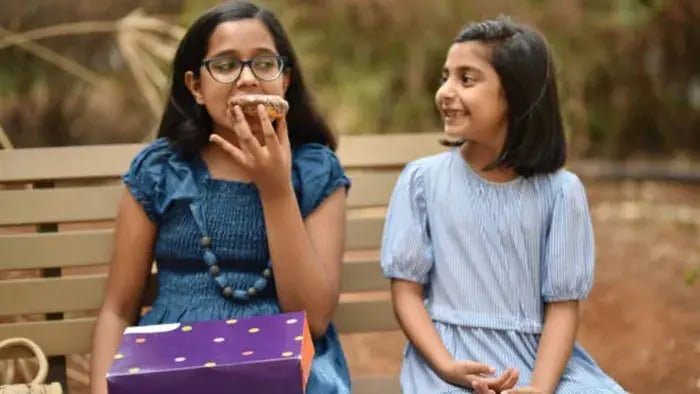 Indian kids eating food