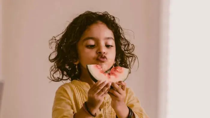 Indian kids eating food