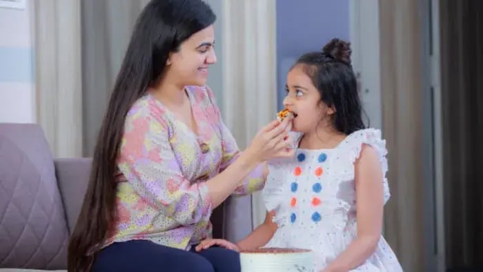 Indian kid eating food