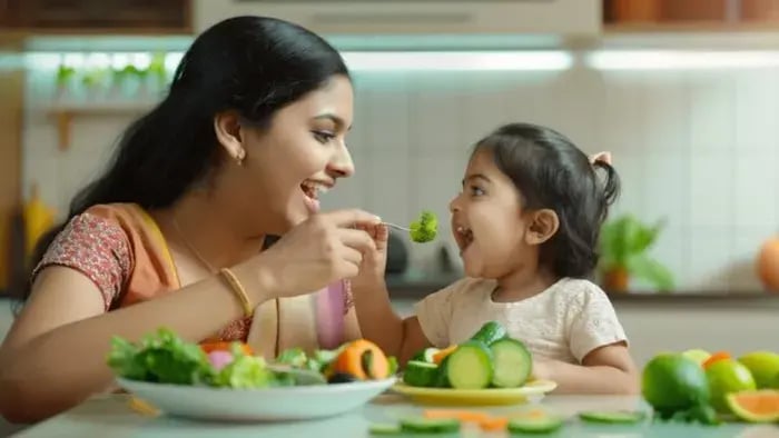 High-Fiber Foods to Promote Digestive Health in Kids - Indian kid having food