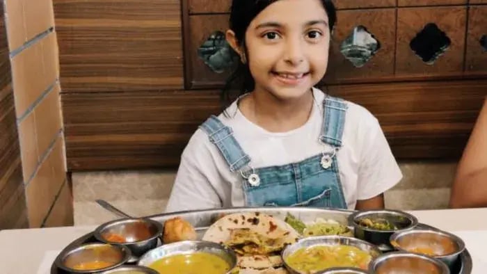 Indian Kid Eating