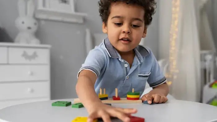 Indian kid enoying educational games