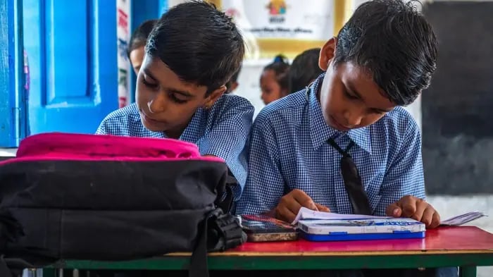 Kid Reading From A Book