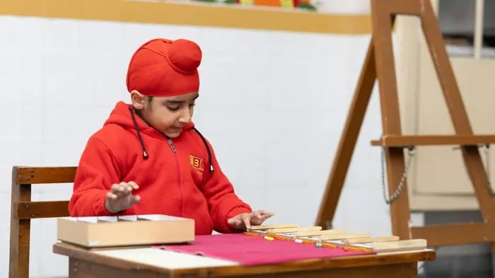 Boy drawing on a sheet