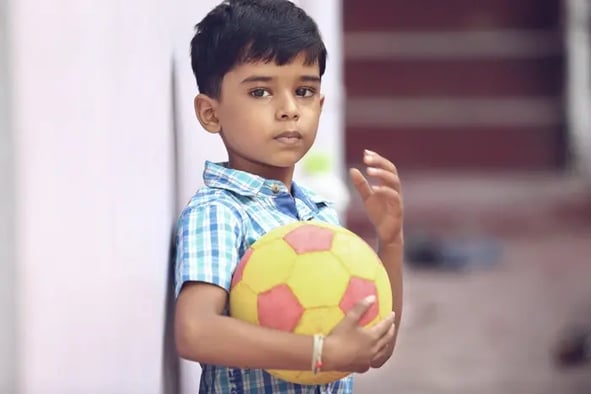 kid with a ball