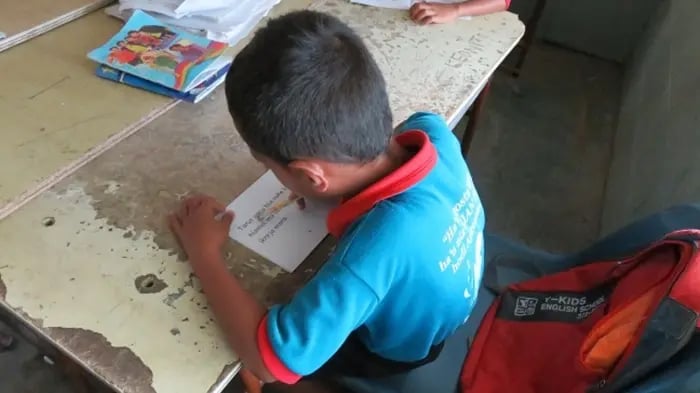 Child Reading Poetry Ardently