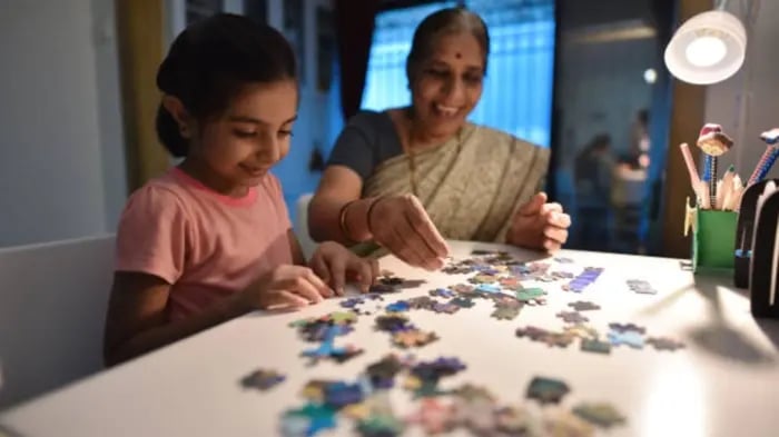 Indian Kid Playing Puzzle