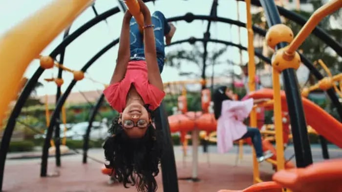 Indian kids doing hanging exercise