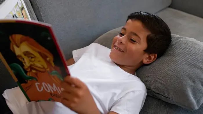 kid-relaxing-while-reading-comic