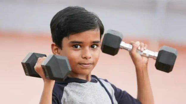 Indian kid doing exercising