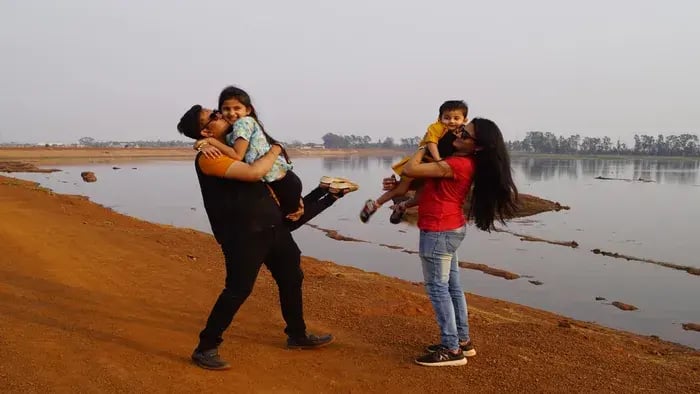 Parents with kids on a beach
