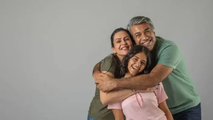 Indian kid with parents