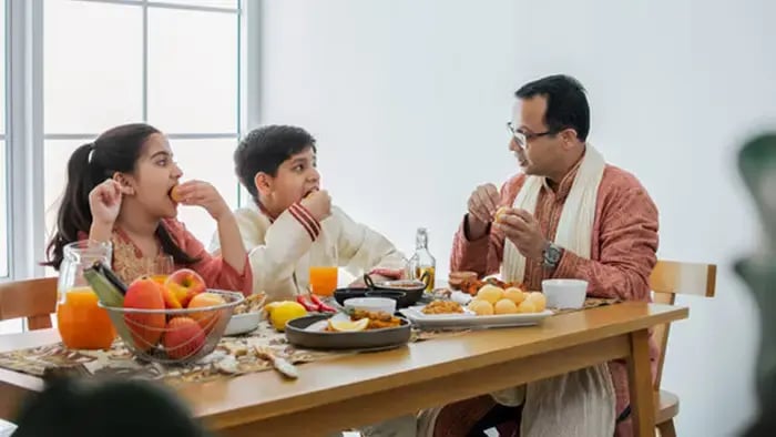 Indian kid eating food