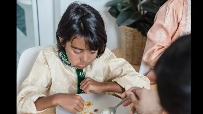 kid having his meal