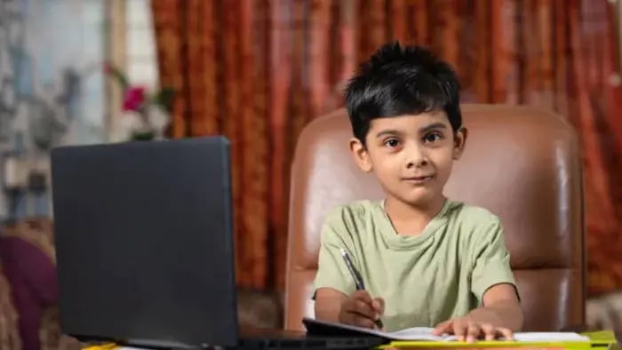 Indian kids working on computer