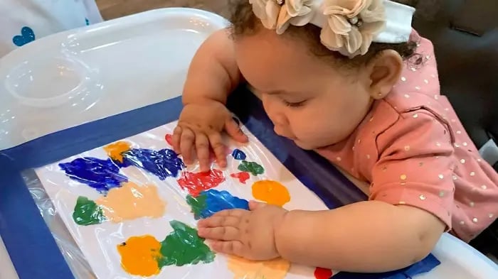 An Adorable 2 Year Old Toddler Painting