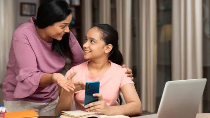 9 Language Development Milestones and Simple At-Home Activities for Children - Indian kids talking to parents