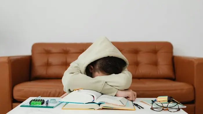 boy tired after studying