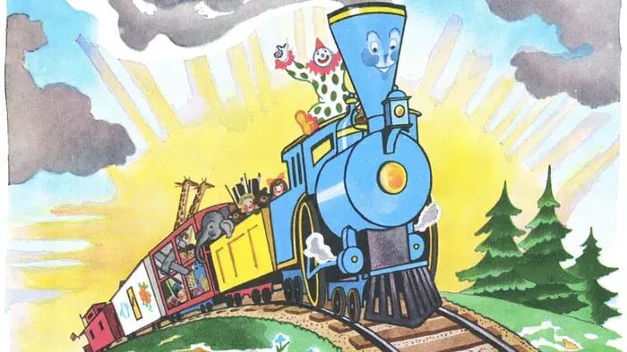 train along with engine running on the tracks