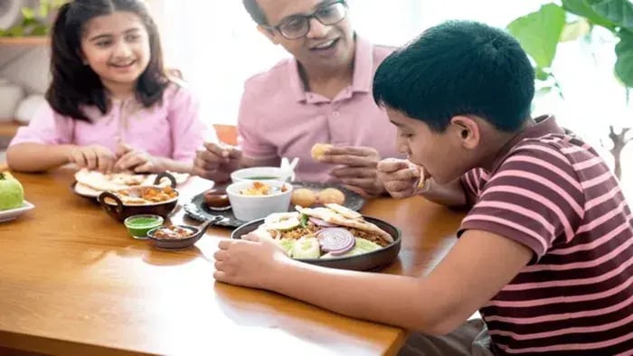 Indian Kids and parents eating