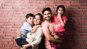 kids smilling with parents