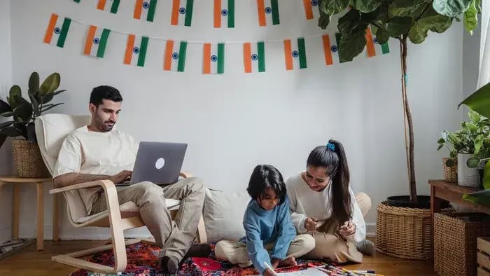 family sitting together and doing a work