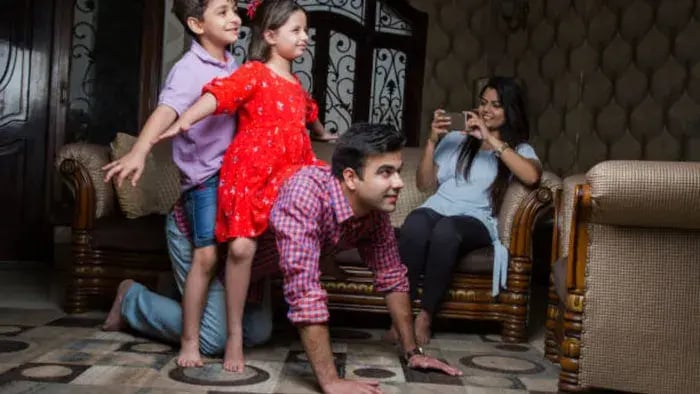 Indian kid with parents
