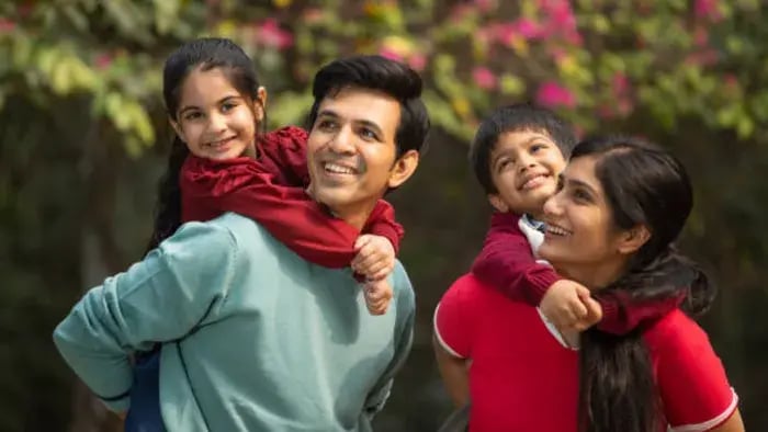 Indian kid with parents