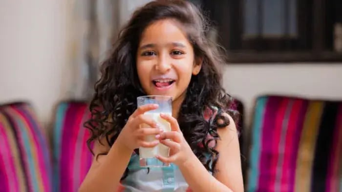 Indian Kids Drinking Milk