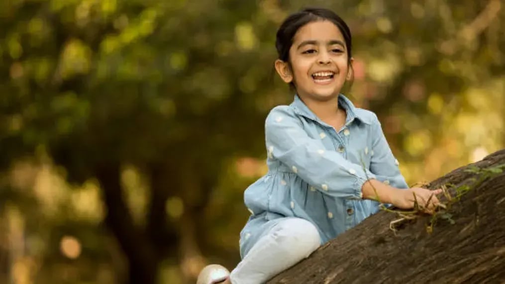 Indian kid playing in park