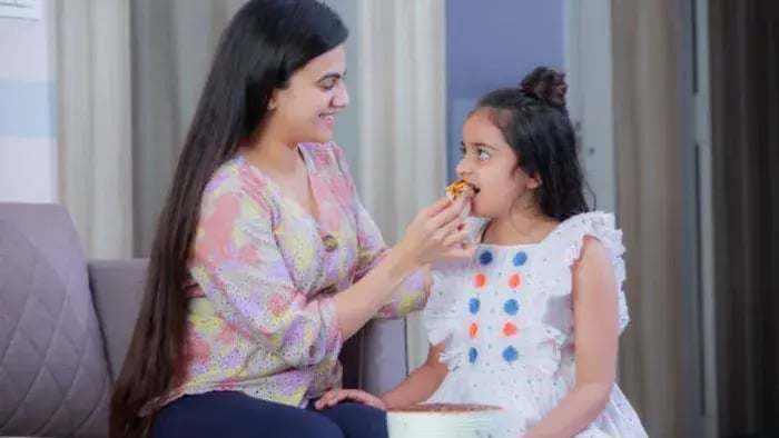 Indian Kids Eating With Parents