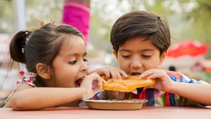 Indian kid having food