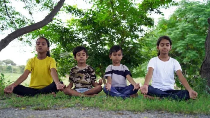 Indian kids doing yoga