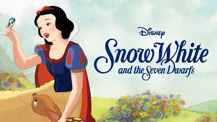 snow white sitting in a garden