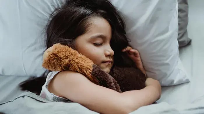 girl sleeping with a mattress