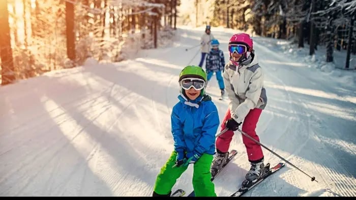 3 Children Playing Comfortably In Winter