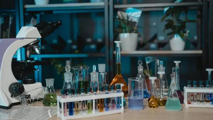 Beaker And Chemicals In A Science Lab