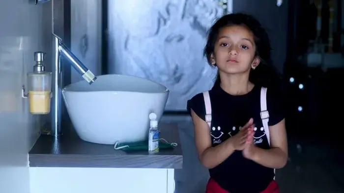 Indian kids washing hands
