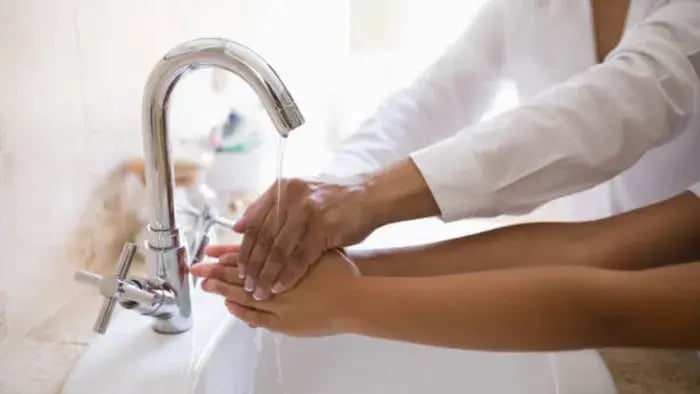 Indian kids washing hands