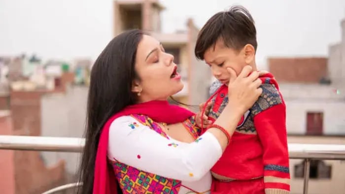 Indian kid with parents