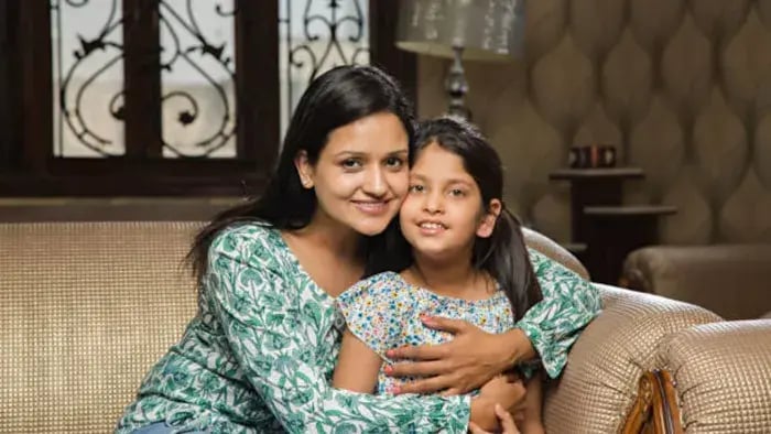 Indian kid with parents