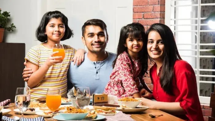 Indian kids and parents eating