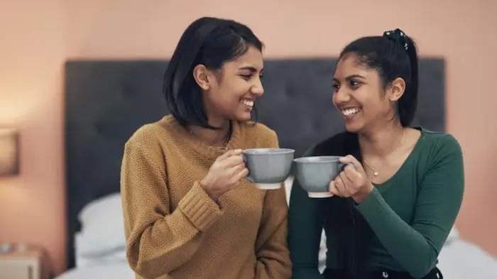 Indian kid drinking hot chocolate