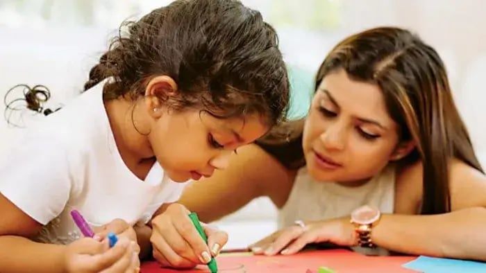 mother coloring with daughter