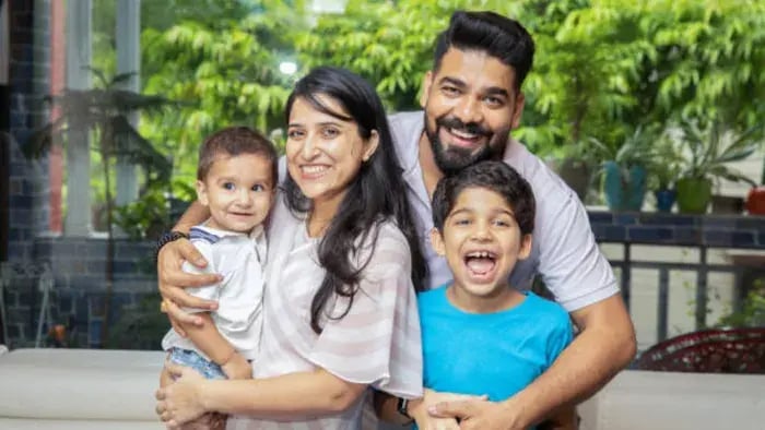 Indian kid with parents