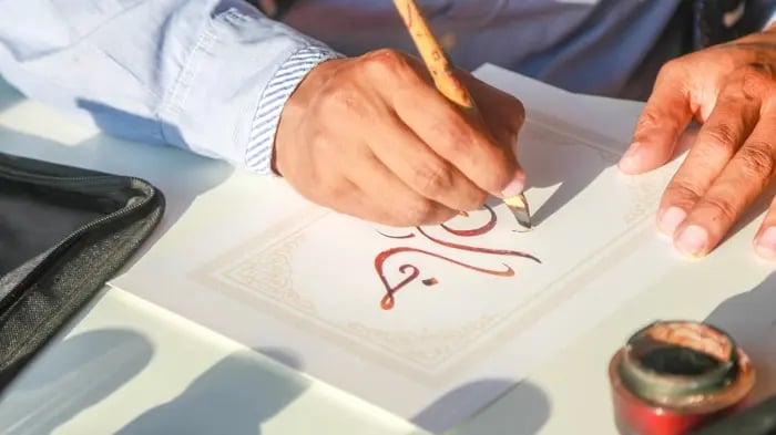 Indian boy doing traditional art