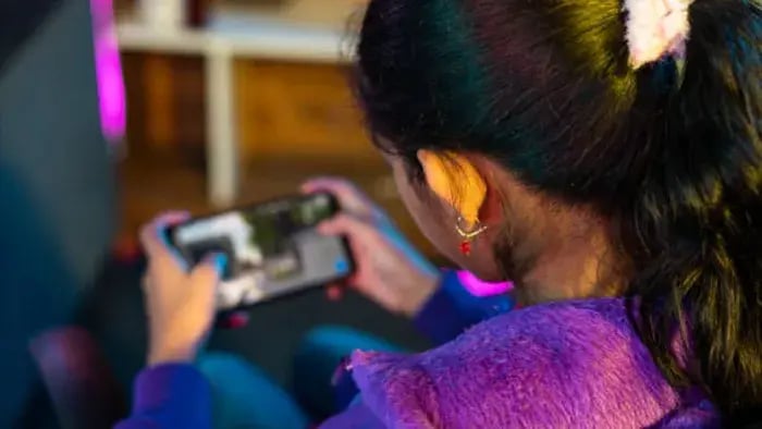 Indian kids using phone