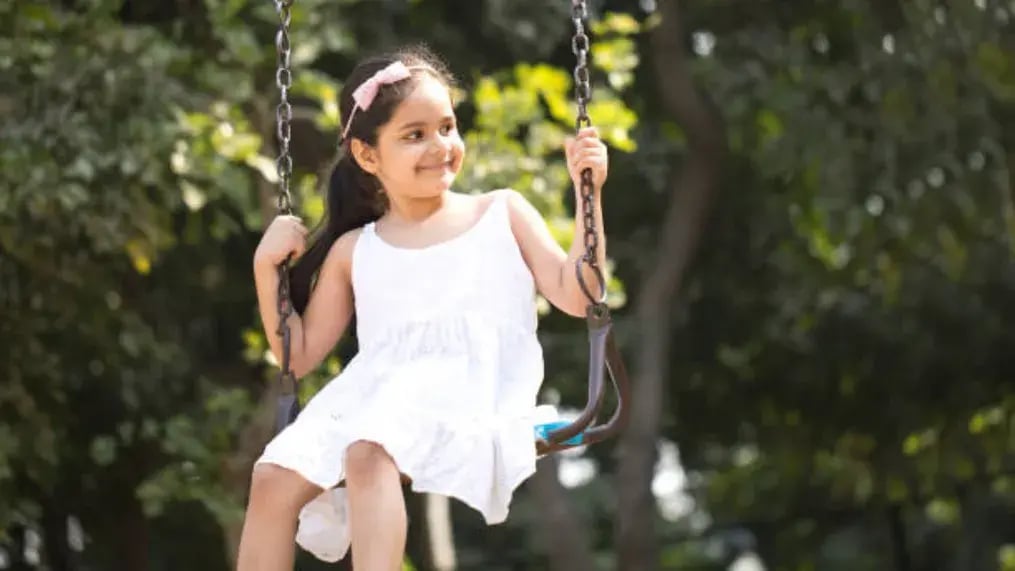 Indian kid playing in park